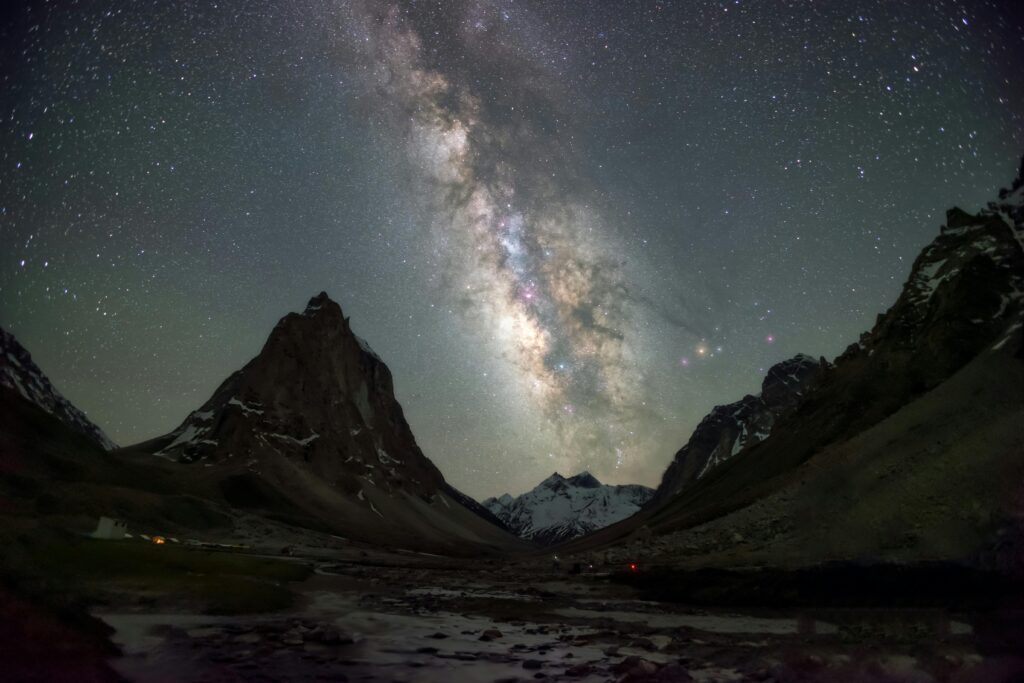 Breathtaking view of the Milky Way illuminating the night sky above the Zanskar mountains.